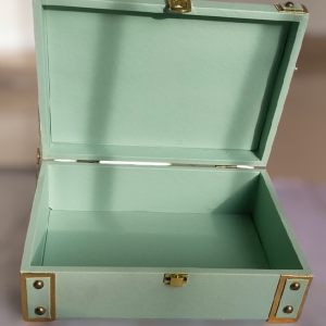 Open Teal box with gold corners and gold lock