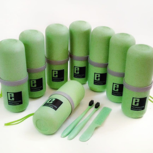 Sustainable green coloured toiletry kit with Toothbrush and comb