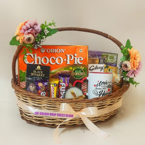 Gift baskets with assorted Confectionaries and coffee mugs