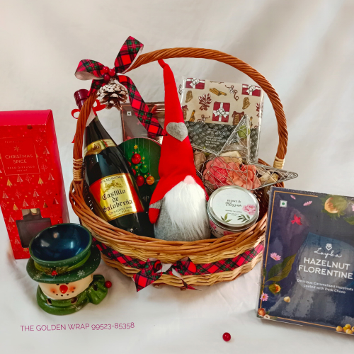 Christmas gift hampers and chocolates with a Santa Gnome