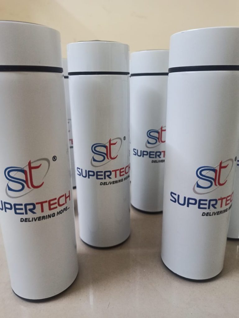 White metal bottles with Supertech logo