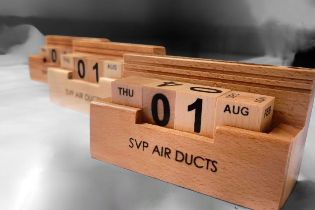 Wooden box with interchangable date cubes