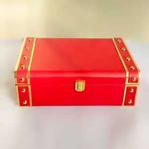 Rectangular Red box with gold corners and gold lock